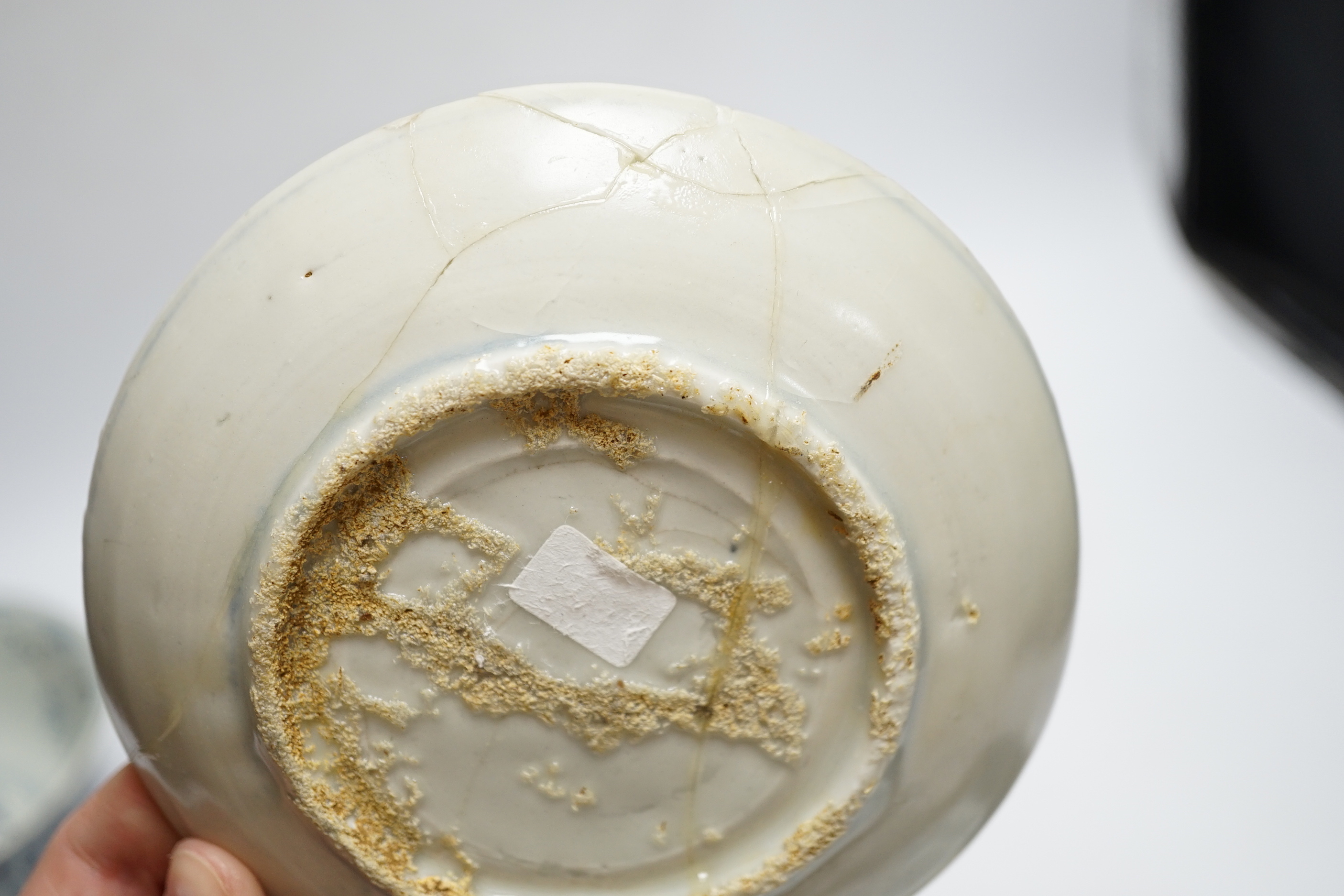 Chinese Ming dynasty shipwreck ceramics - three blue and white pottery bowls and three dishes, largest 25cm diameter
